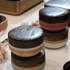 樺細工や曲げわっぱ、ろくろ引きなど伝統工芸に、日本の伝統色をあしらったテーブルウエアシリーズ「花霞（ハナガスミ）」